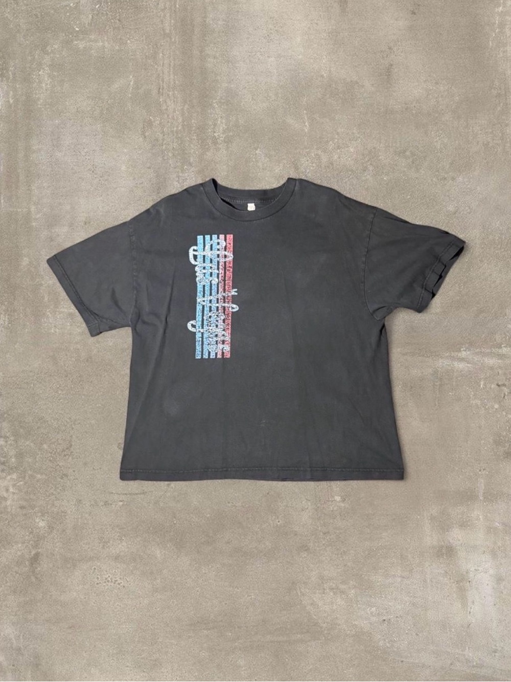 Black vintage 90s graphic tee with vertical stripes